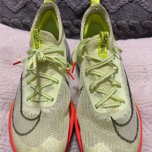 Nike Neon Yellow Knit Running Shoes with Coral Soles